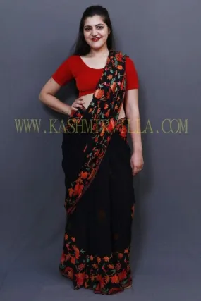 Evergreen Black Colour Saree With Dense Aari Jaal On Pallu And Flowral Motifs.