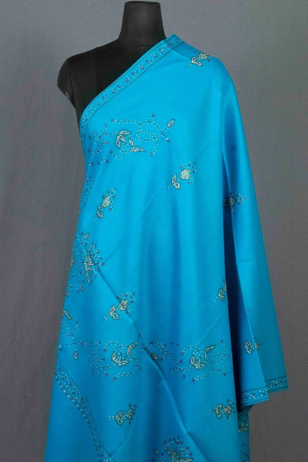 Exotic  Firozi Colour Sozni Shawl Emblished With Designer Over All Jaal And Border.